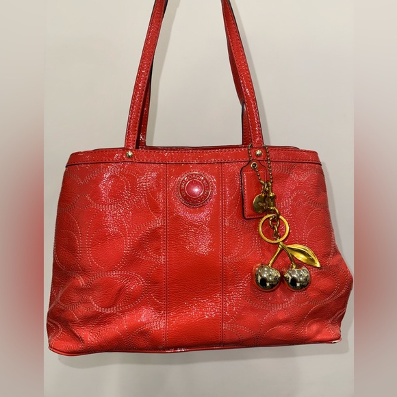 Coach Persimmon Signature Keepall w/Cherry Charm - Picture 1 of 5